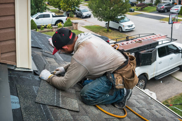 Professional Roofing technician working in Clifton, NJ